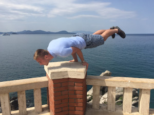 Piombino, Tuscany, Italy - Showing off my elbow lever by the lighthouse before our ferry ride to Elba during my 2018 April tour to Italy.