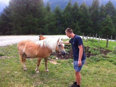 Jausenstation Bodenalm, Austria - Petting a pony on our 2015 family vacation